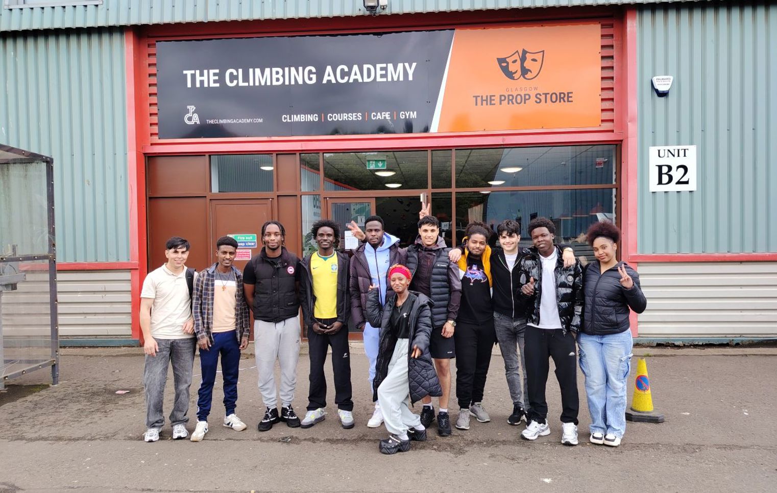 ESOL students gathered outside the Climbing Academy before taking part in climbing activities.