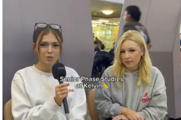 Two senior phase students at Glasgow Kelvin College sit in a relaxed setting, one holding a microphone as they talk about their experience. Text on screen reads “Senior Phase Studies at Kelvin” and “Kelvin College we're in our senior phase