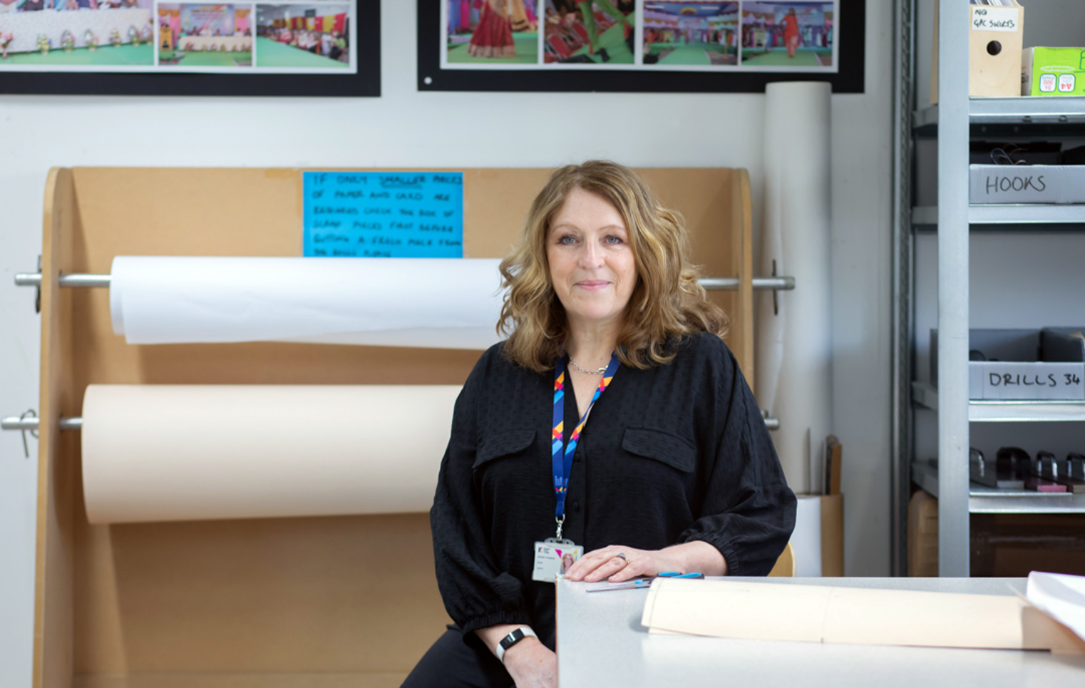 Fashion lecturer in a pattern cutting and garment construction workspace at Glasgow Kelvin College.