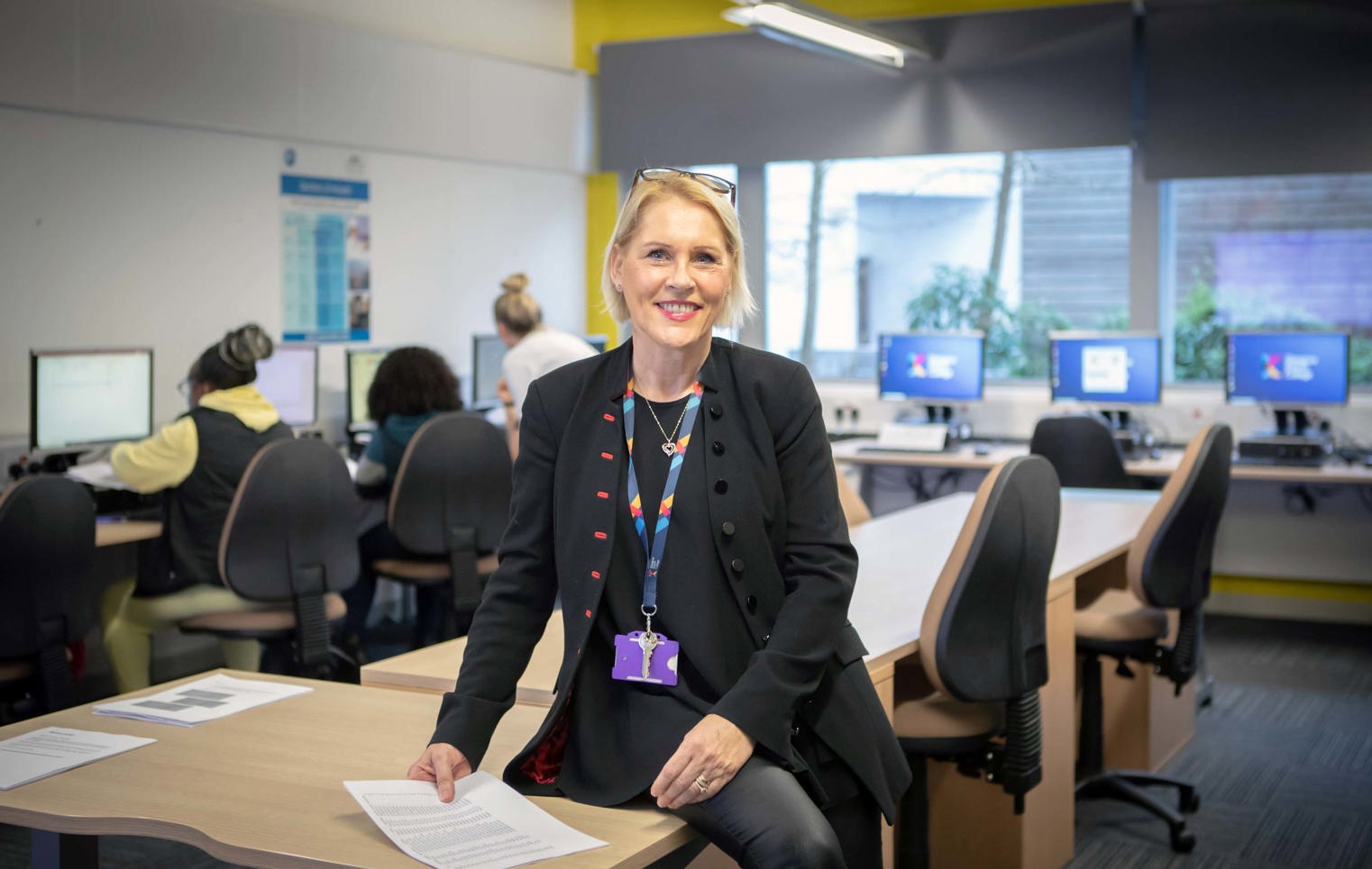 Business and Administration lecturer in a computer classroom at Glasgow Kelvin College.