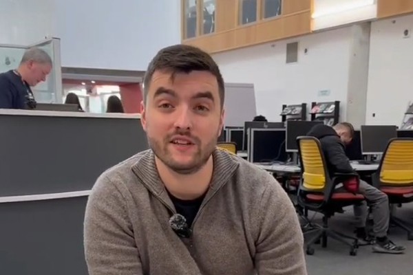 Access to Medicine student Alexander speaking during an interview in the library at Glasgow Kelvin College.
