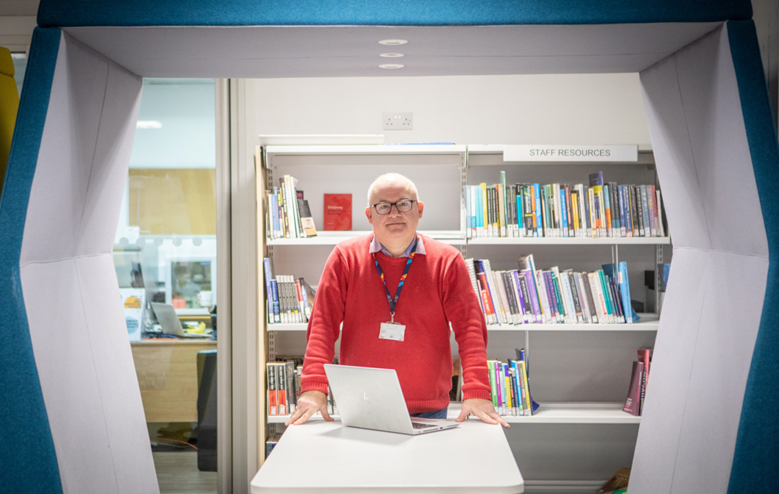 Advice and Guidance staff member in a learning resource area at Glasgow Kelvin College.