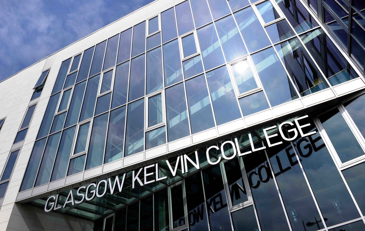 Close-up of Glasgow Kelvin College Springburn Campus entrance, highlighting the building’s modern design and glass-panelled exterior.